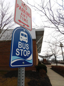 A photo of a Allen County Regional Transit Authority Bus Stop Sign. The ACRTA provides afe, dependable, courteous, and cost-effective transportation service to Allen County residents.